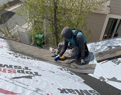 Roofing Contractors Lakewood Colorado Installing Underlayment and Shingles
